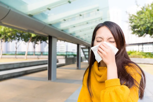 Asian woman blowing nose — Stock Photo, Image