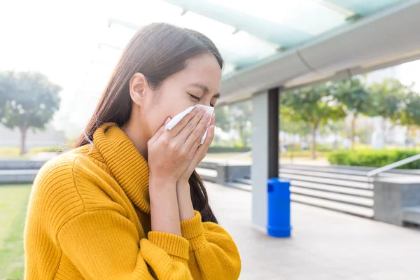 Asian woman blowing nose — Stock Photo, Image