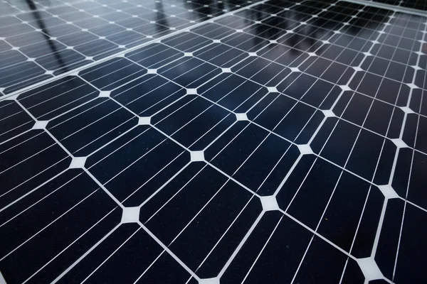 Solar panels on rooftop of building — Stock Photo, Image