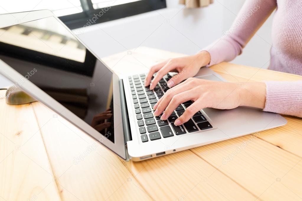 Woman using laptop computer