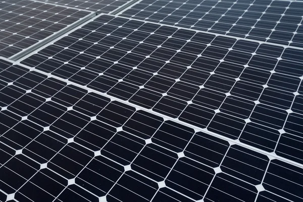 Solar panels on rooftop of building — Stock Photo, Image