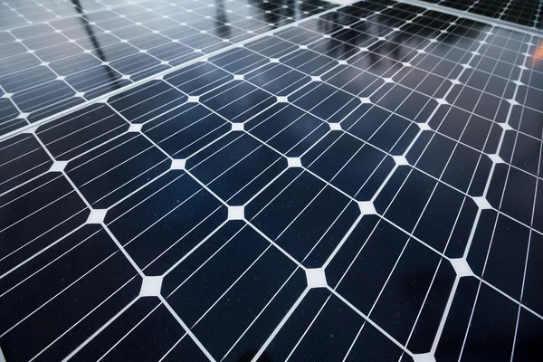 Solar panels on rooftop of building — Stock Photo, Image