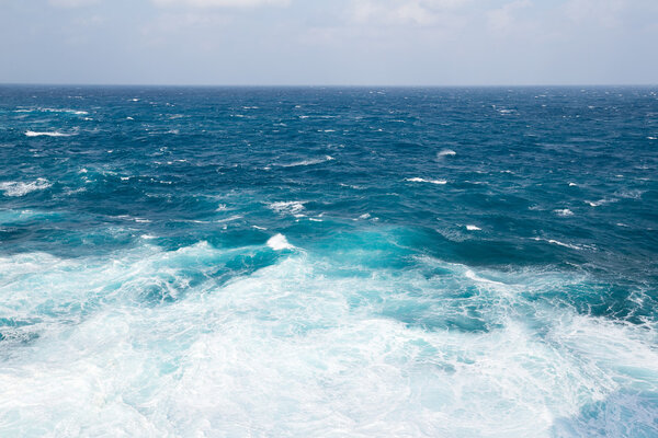 blue sea surface and waves