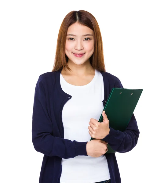 Aziatische jonge vrouw in blauwe vest — Stockfoto