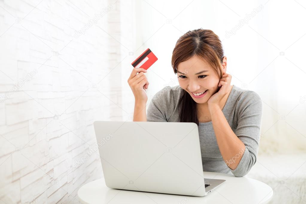 Asian young woman shopping online