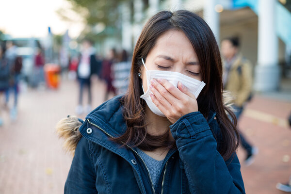woman wearing medical face mask