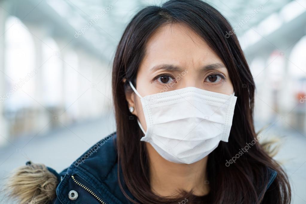 woman wearing medical face mask