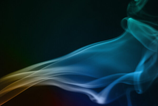 Abstract smoke multicolored wave background.