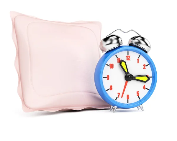 Reloj despertador y almohada — Foto de Stock