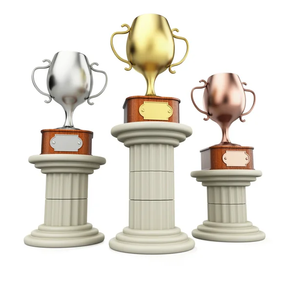 Winners cups on columns — Stock Photo, Image