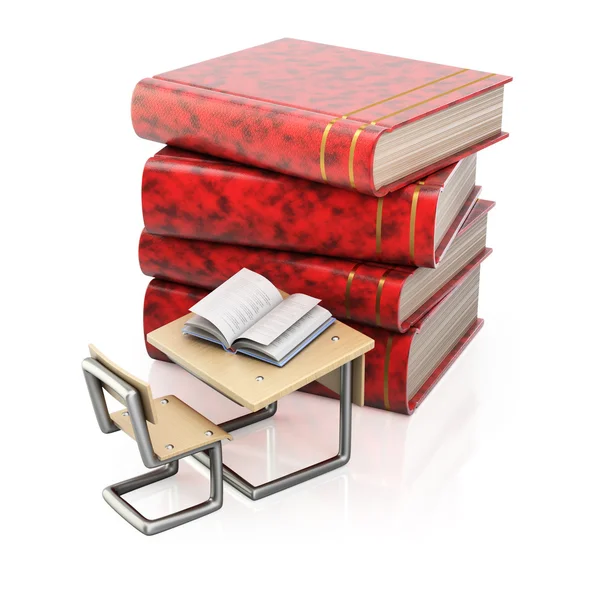 Куча книг и школьный стол — стоковое фото