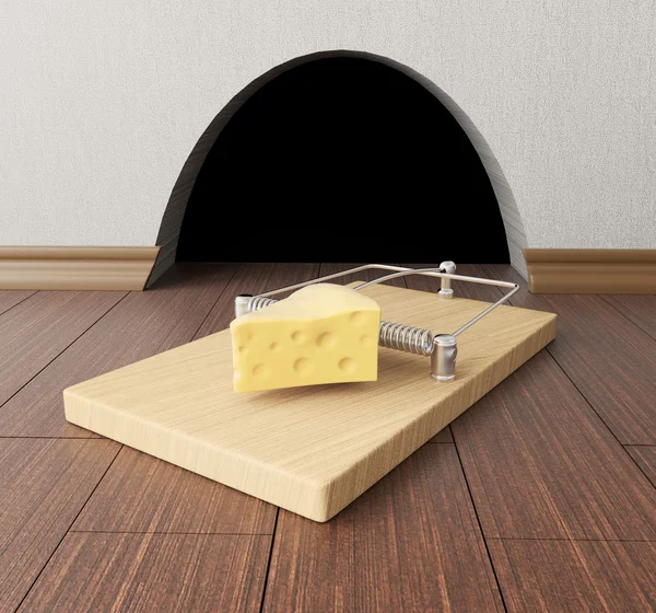 Mousetrap near mouse hole — Stock Photo, Image