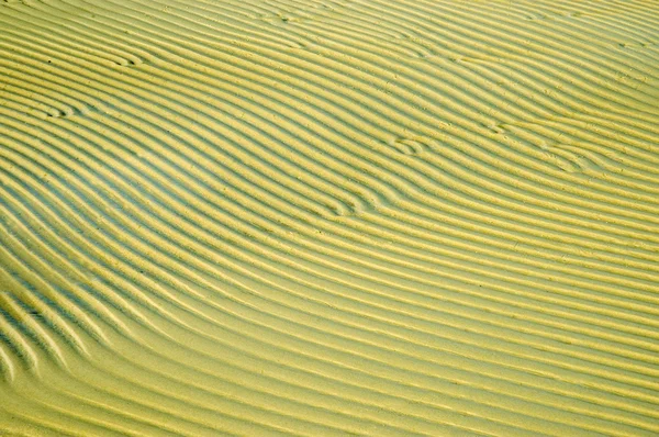 The structure of the sand on the beach — Stock Photo, Image