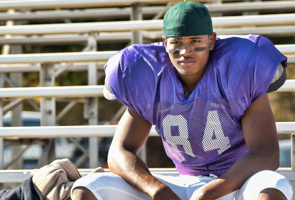 Photo Football Player Watching Bleachers — Stock Photo, Image