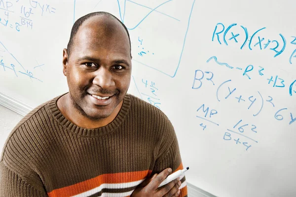 Photo Professor Standing Equations Whiteboard — Stock Photo, Image