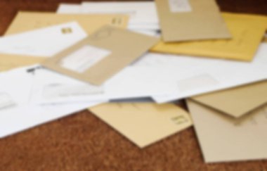 Close up of a pile of mail on doormat clipart