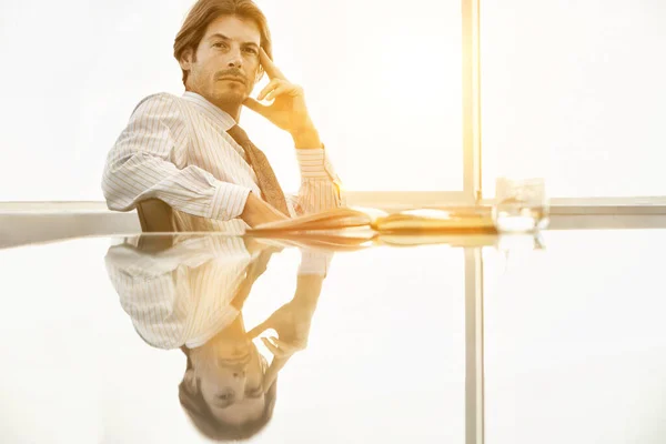 Portrait Confident Businessman Hand Face Sitting Conference Table — Stock Photo, Image