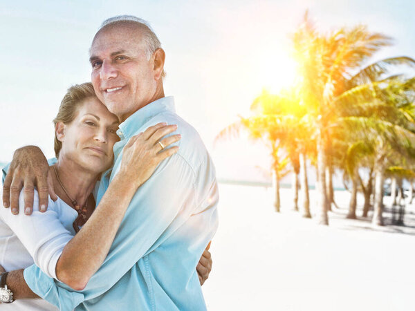 Portrait Senior Couple Showing Affection Beach Stock Image