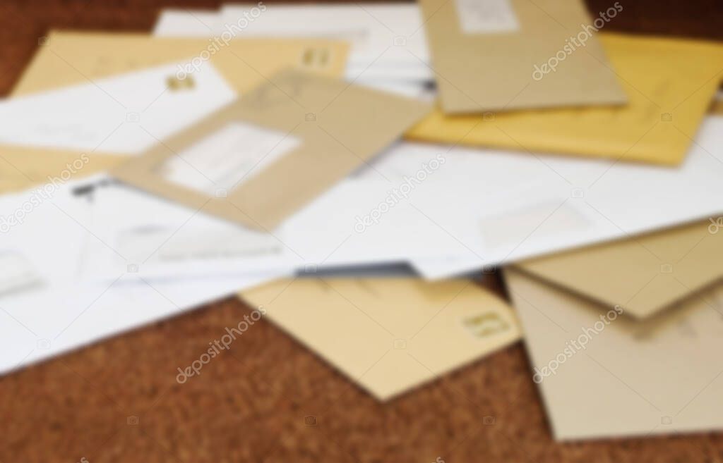 Close up of a pile of mail on doormat