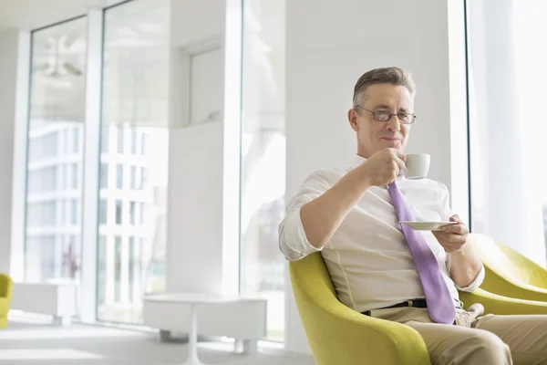 Businessman having coffee — Stock Photo, Image