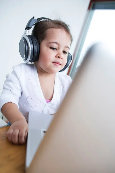 Girl wearing headphones — Stock Photo, Image