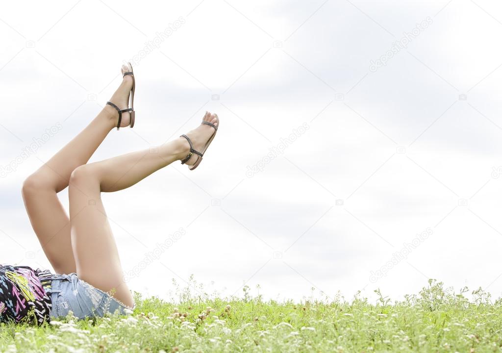 Woman  lying on grass