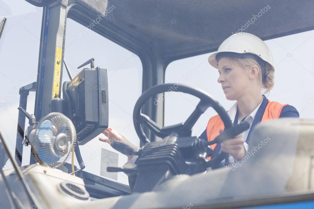 worker operating forklift truc