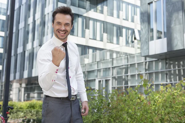 Businessman with clenched fist standing — Stock Photo, Image