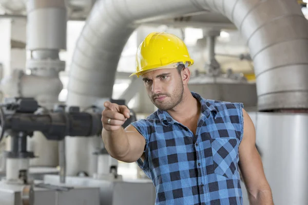 Worker pointing away — Stock Photo, Image