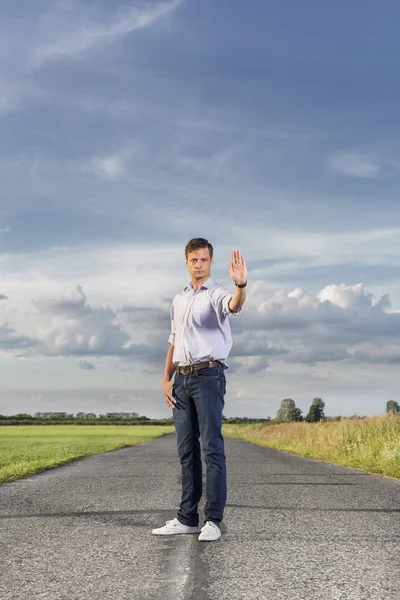 Man making stop gesture — Stock Photo, Image