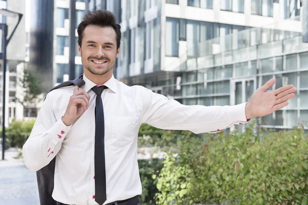 Confident businessman gesturing — Stock Photo, Image
