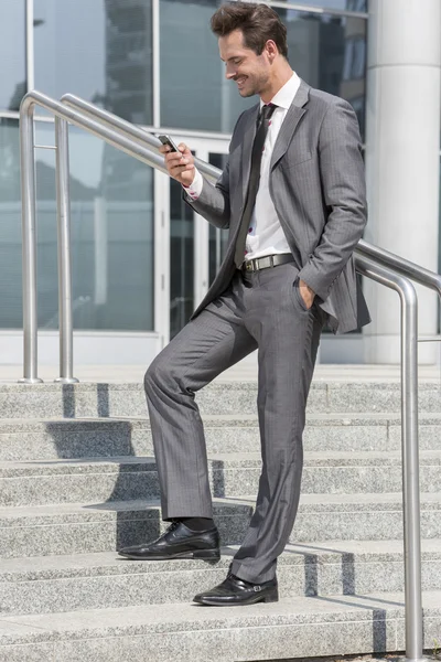 Businessman text messaging — Stock Photo, Image