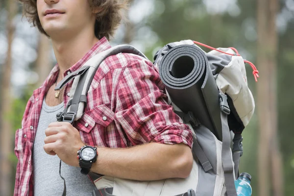 Male hiker carrying backpack — Stock Photo, Image