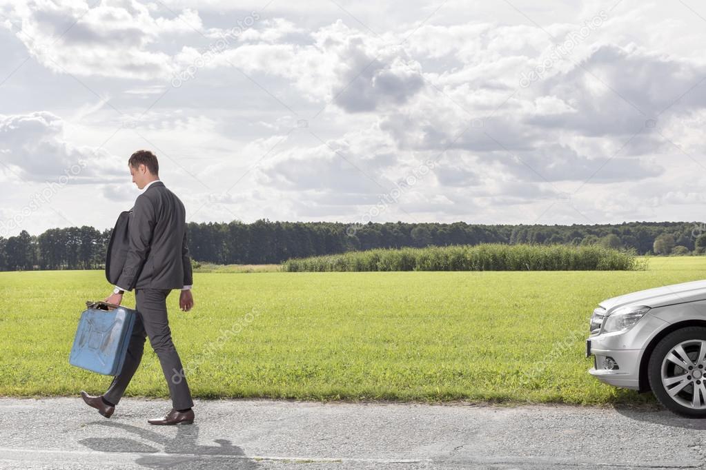 Businessman  leaving car