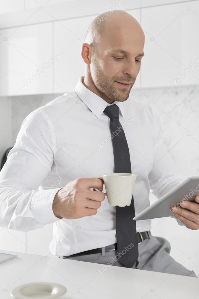 Businessman having coffee