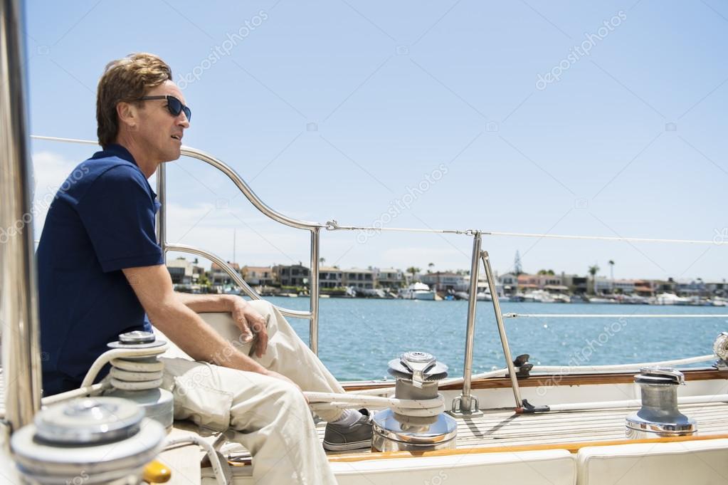 Man sitting on yacht