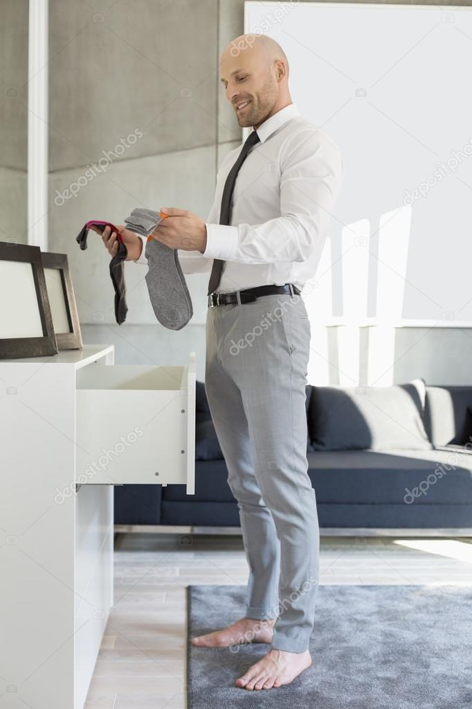 Businessman selecting socks
