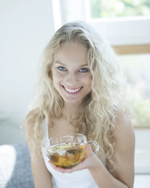 Woman holding herbal tea — Stock Photo, Image