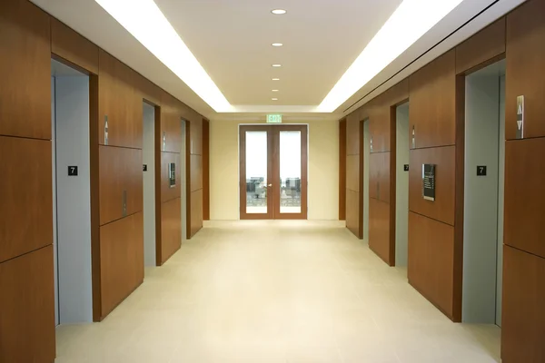 Empty hallway between elevators — Stock Photo, Image