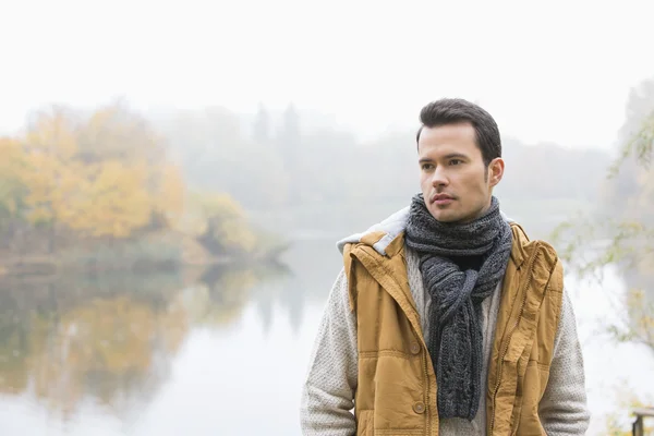 Man in warm clothing standing — Stock Photo, Image