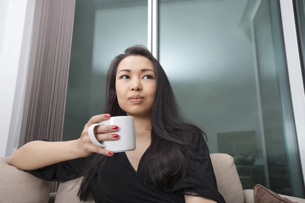 Woman having coffee