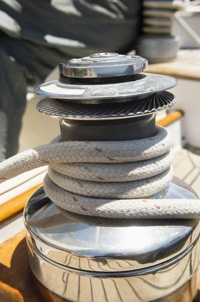 Rope wound around winch on sailboat — Stock Photo, Image