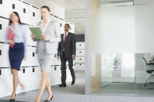 Businesswomen walking in office — Stock Photo, Image