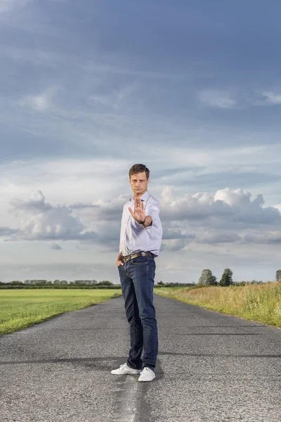 Muž při zastavení gesto — Stock fotografie
