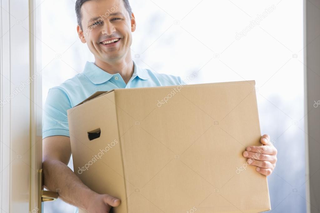 Man carrying cardboard box