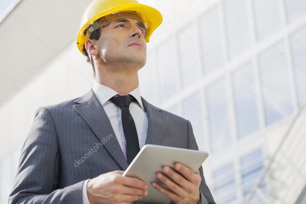 Architect holding tablet PC