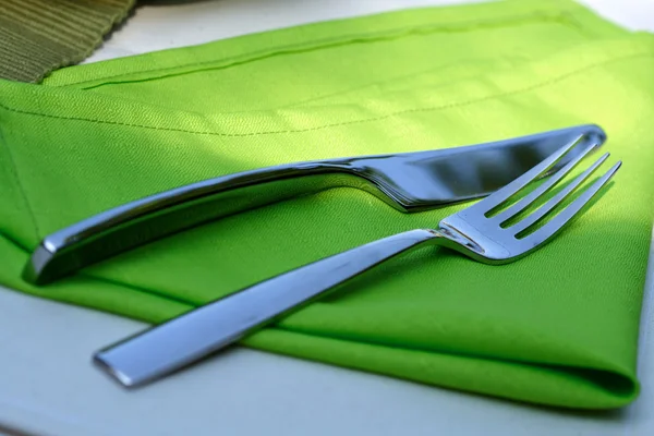 Fork and knife on cloth — Stock Photo, Image