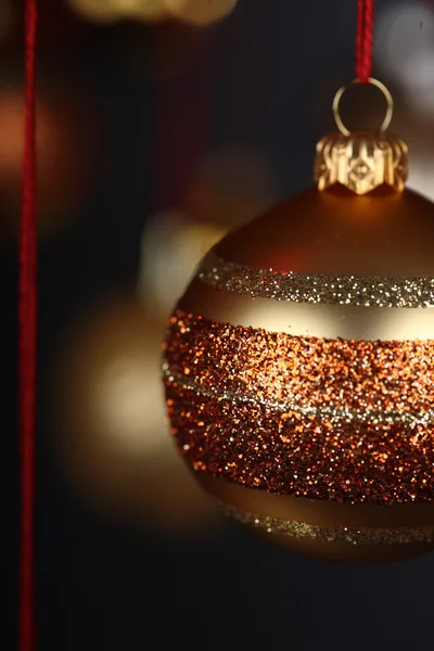 Golden Christmass bauble — Stock Photo, Image
