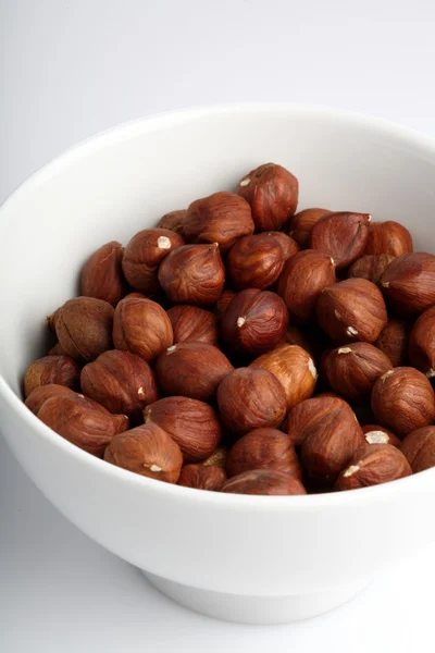 Tasty Huzelnuts in bowl — Stock Photo, Image