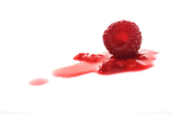 Raspberry on fresh juice — Stock Photo, Image